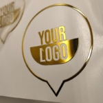 Round gold custom logo sticker with placeholder text